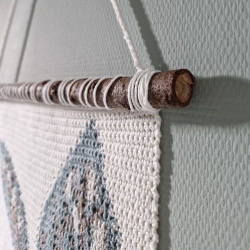 Wall hanging with leaves