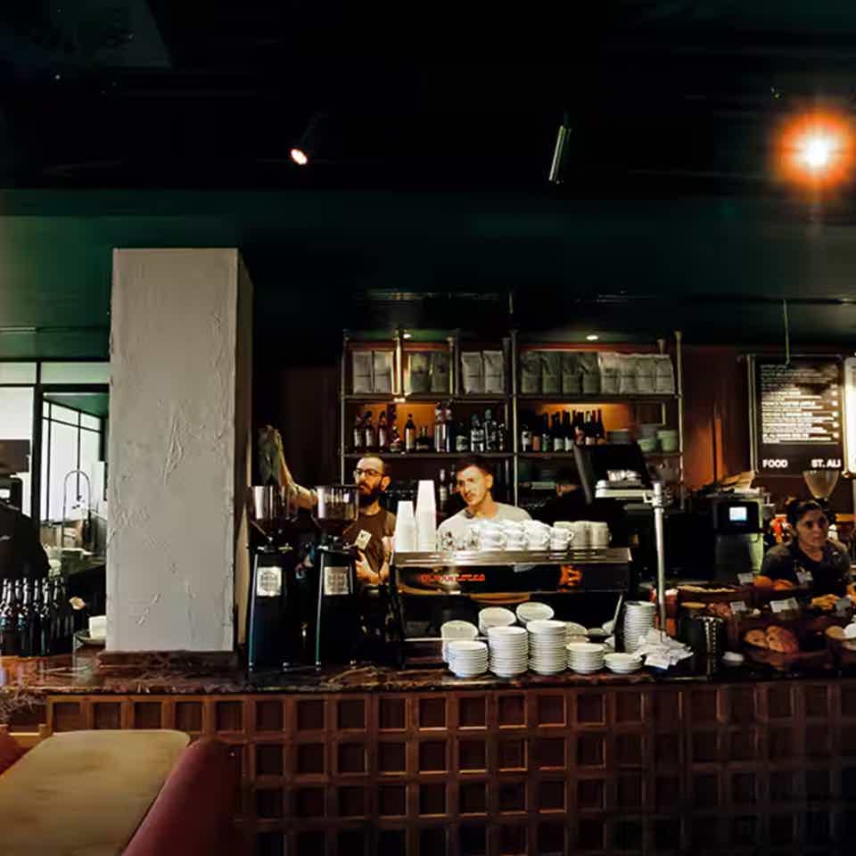 cafe interior with baristas working