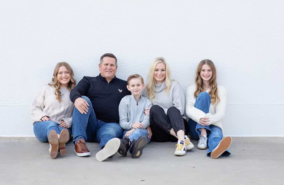 Franchise Owners of Primrose School Mandi & Kevin McCombs with their family