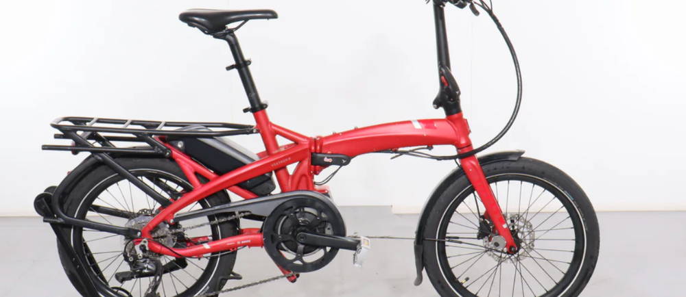 a red Tern Vektron Q9 electric folding bike