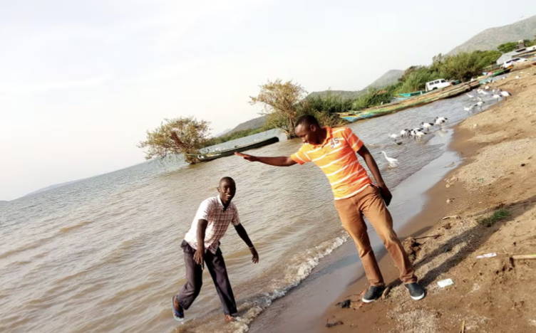 adults laying in water