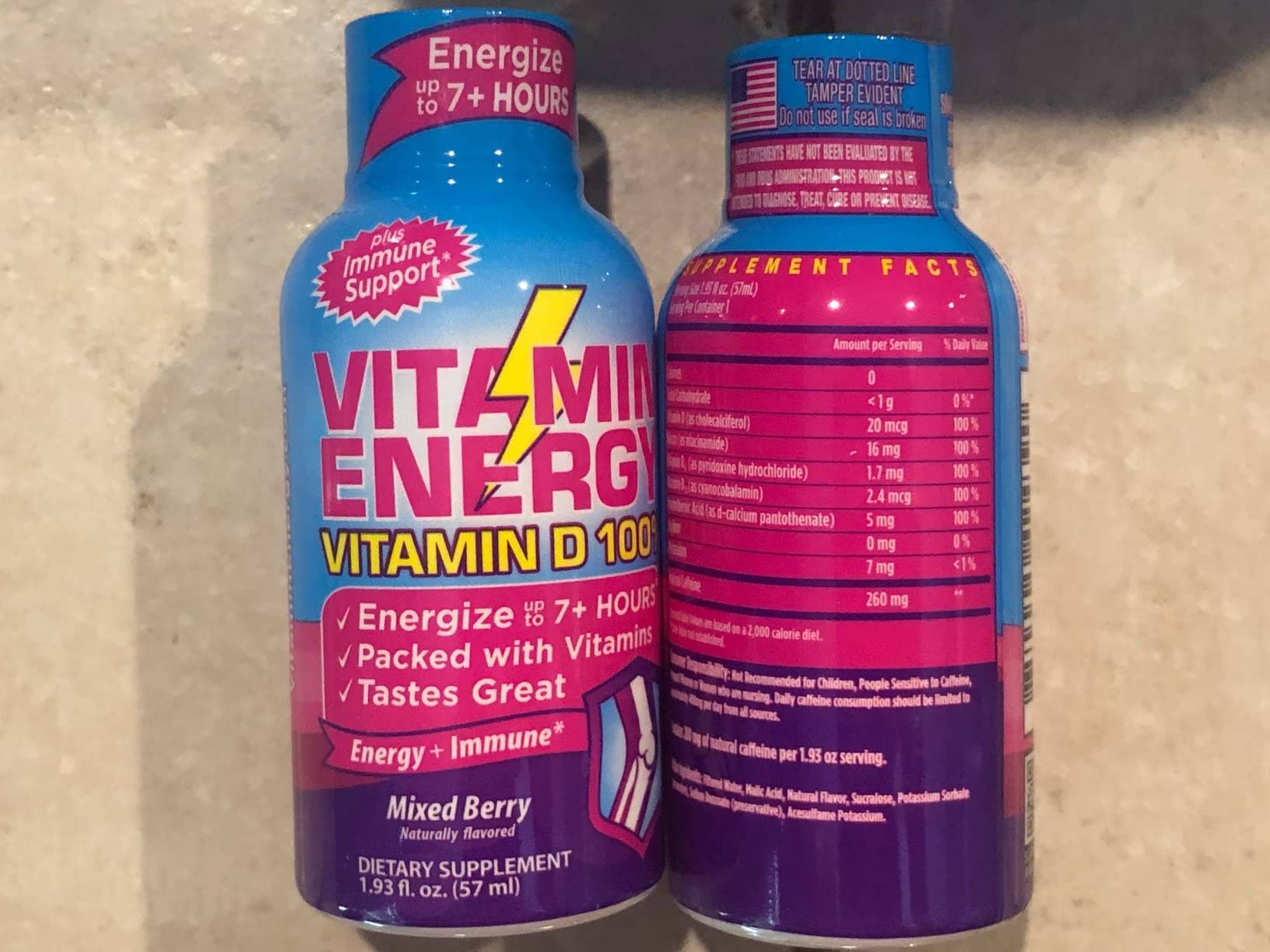Two bottles of Vitamin Energy supplement with Vitamin D 1000 IU, Mixed Berry flavor.