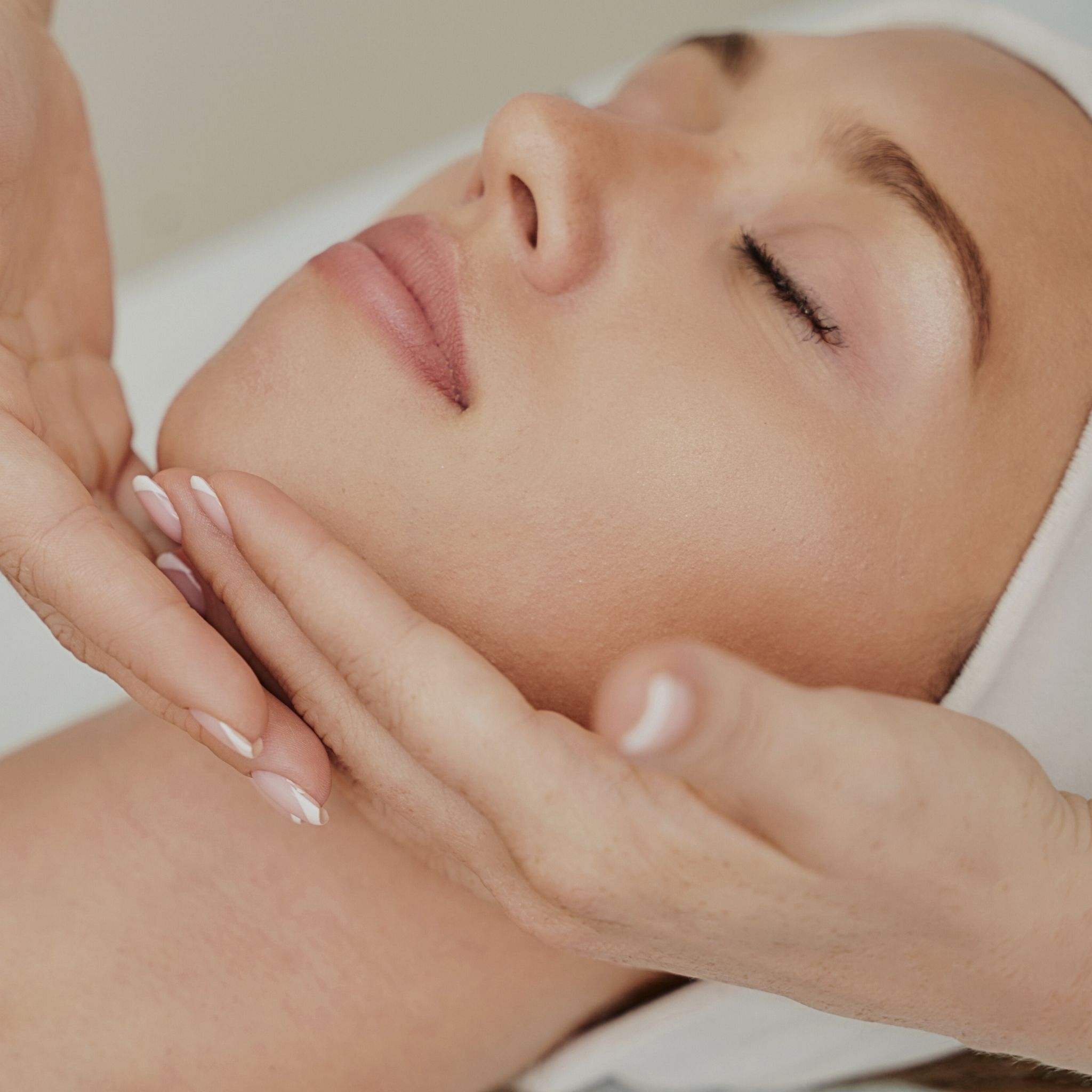 Model undergoing Morpheus8 treatment for facial rejuvenation at Studios Vis a Vis Toronto