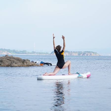 Yoga paddle boards has wide paddleboards and suitable for fitness paddlers do hard difficult moves on a Canadian lake