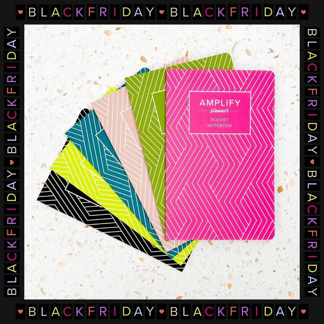 stack of amplify planner pocket notebooks with black friday frame