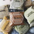 Multiple plastic spice pouches labeled Certified Organic, each labeled with the spice it contains