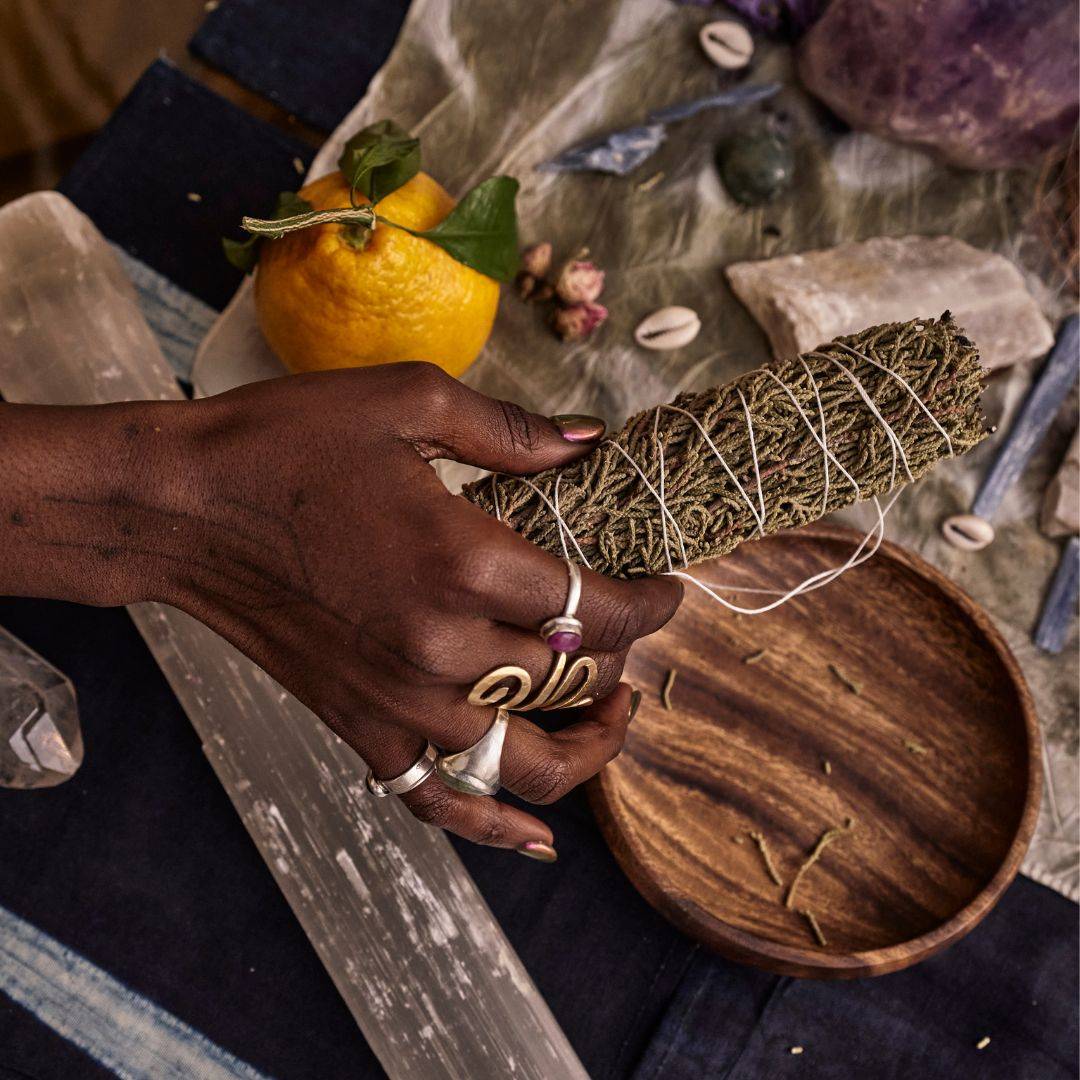 Smudging crystals with Sage