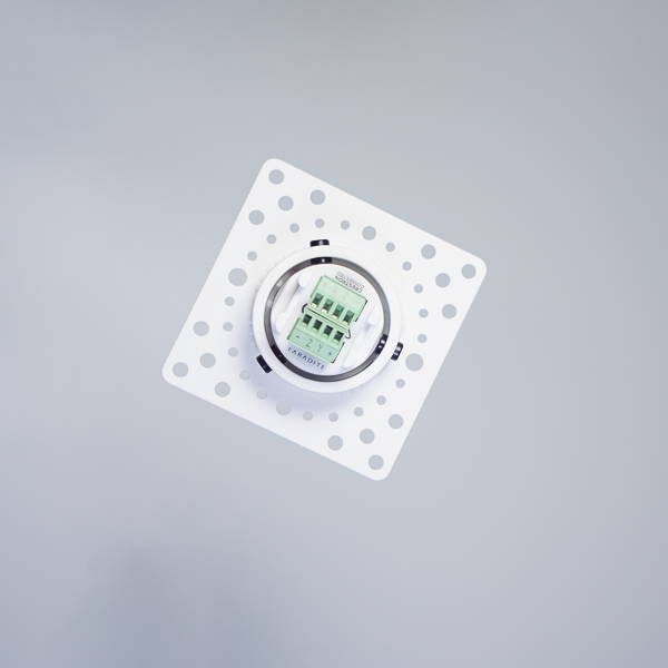 Faradite TAP-5 smart home light switch on decorative wall