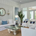 Image is of St Barts White Slipcovered Sofas and a driftwood coffee table. 