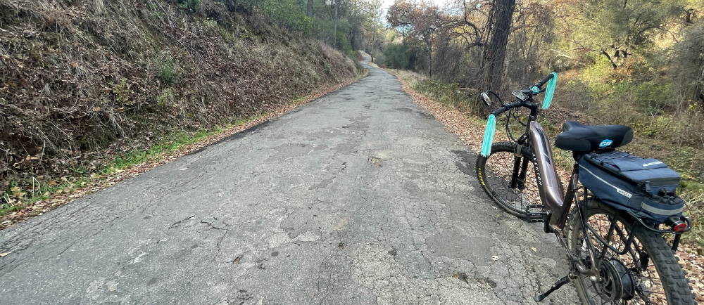 an aventon level electric bike on a quiet road in mariposa, california