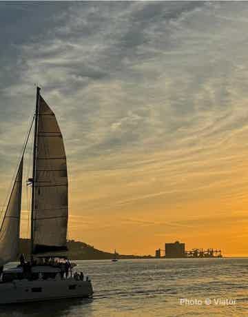 Admire Lisbon landmarks illuminated by night