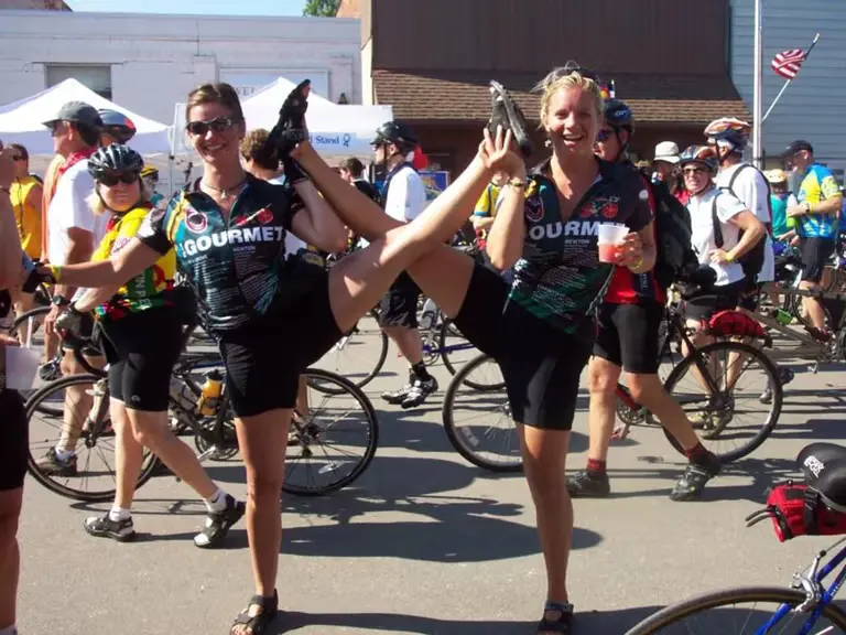 Photo of Dana and a women after completing bike race.