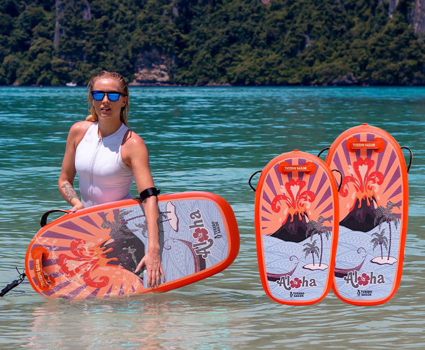 A woman wearing sunglasses holds an orange-pink bodyboard in her hands at the beach