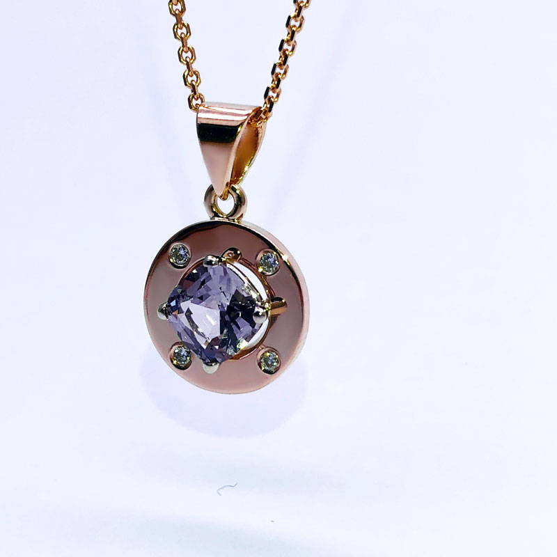 Custom-made pendant in pink gold with a cushion-cut amethyst in the center and 4 small diamonds