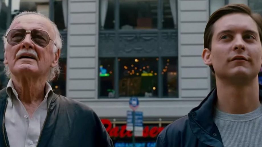 Scene from Spiderman 2. Peter Parker and Stan Lee stand side by side looking above them. Stan is giving a monologue.