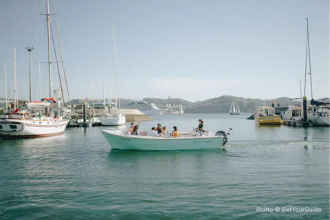 Sunset Boat Tour with local Snacks & Drinks