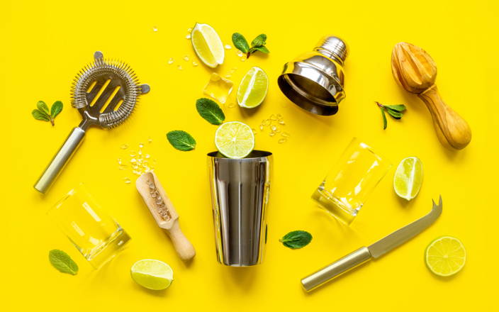 Supplies for a Cocktail Class, including bar tools, cocktail ingredients, and glass (preview)