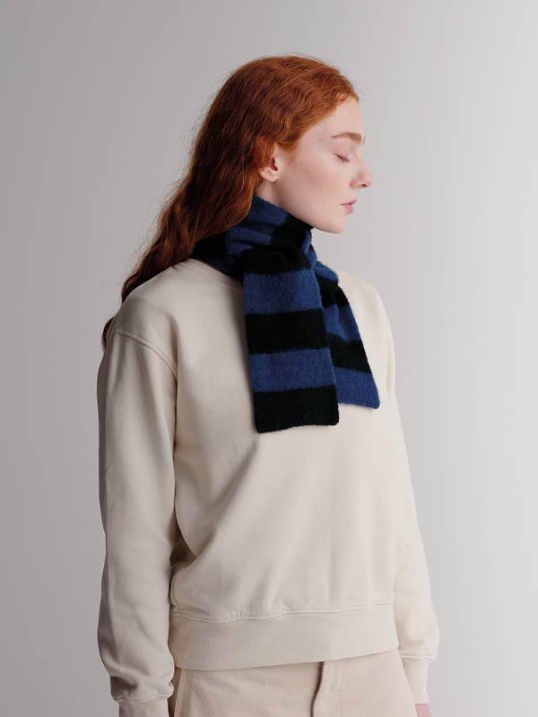 model wears Small Brushed Stripe Scarf Black & Nightsky