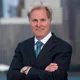 What Tom Bradley's first post-TD Ameritrade gig says about him is interesting and his specific MaxMyInterest robo mission, more so