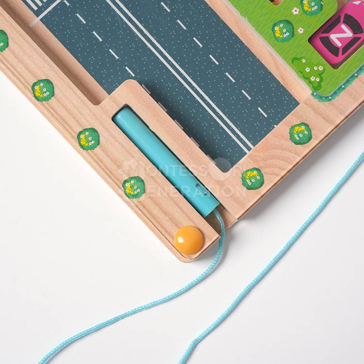 Close up on the magnetic pen featured on the Montessori Alphabet Parking Maze.