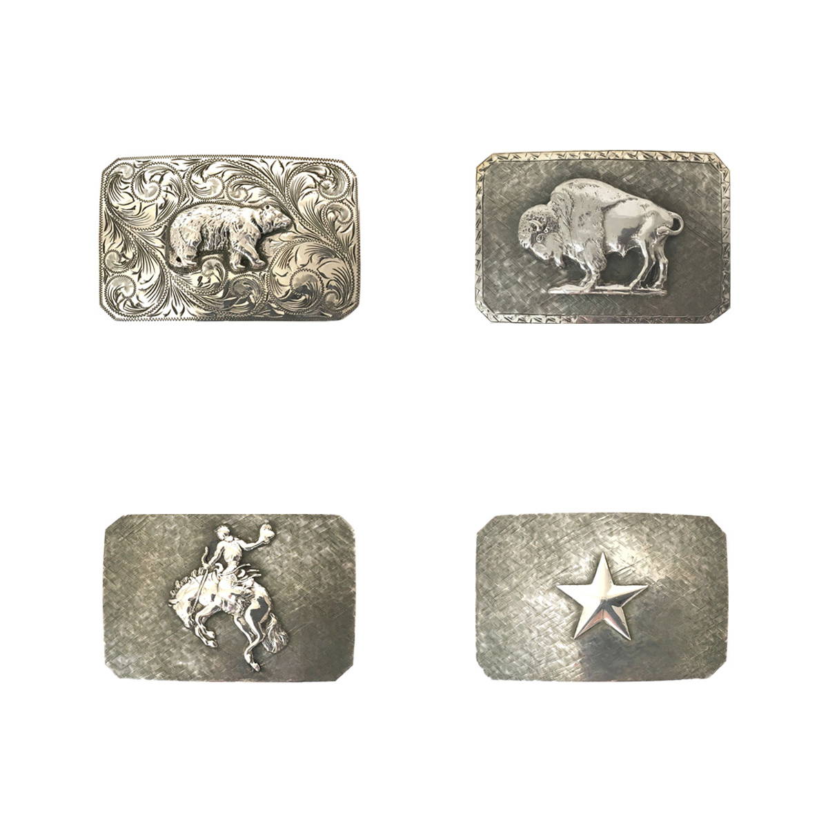 Display of western-style sterling silver belt buckles with bear, bison, bronco and star design