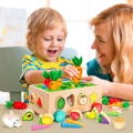 Mother and son playing wooden Montessori toy with carrots, bunny, fruits, and vegetables..