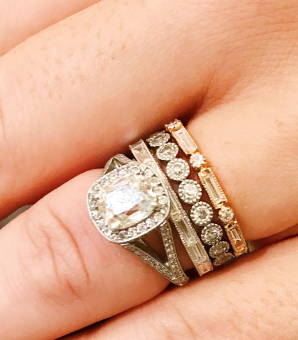 Cushion cut vintage diamond ring with baguette diamonds stacked with the Silhouette and Lucy Signature Stacking Rings