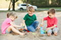 Children playing in the sand. 