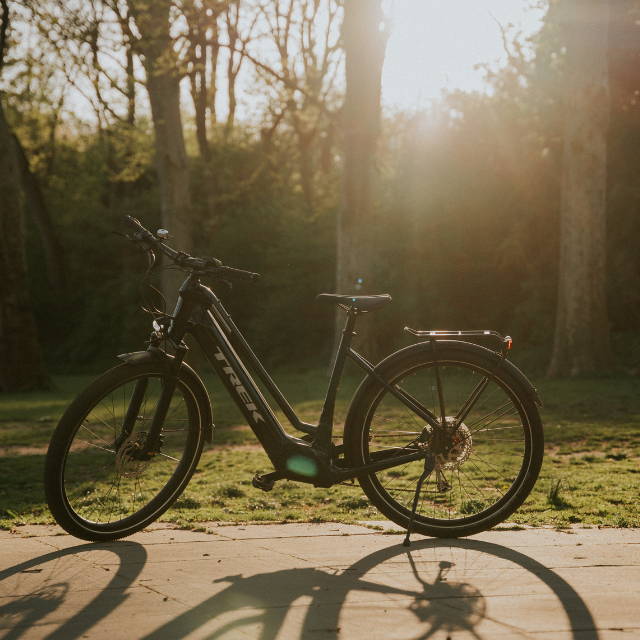 A Trek Allant electric bike in the sunset