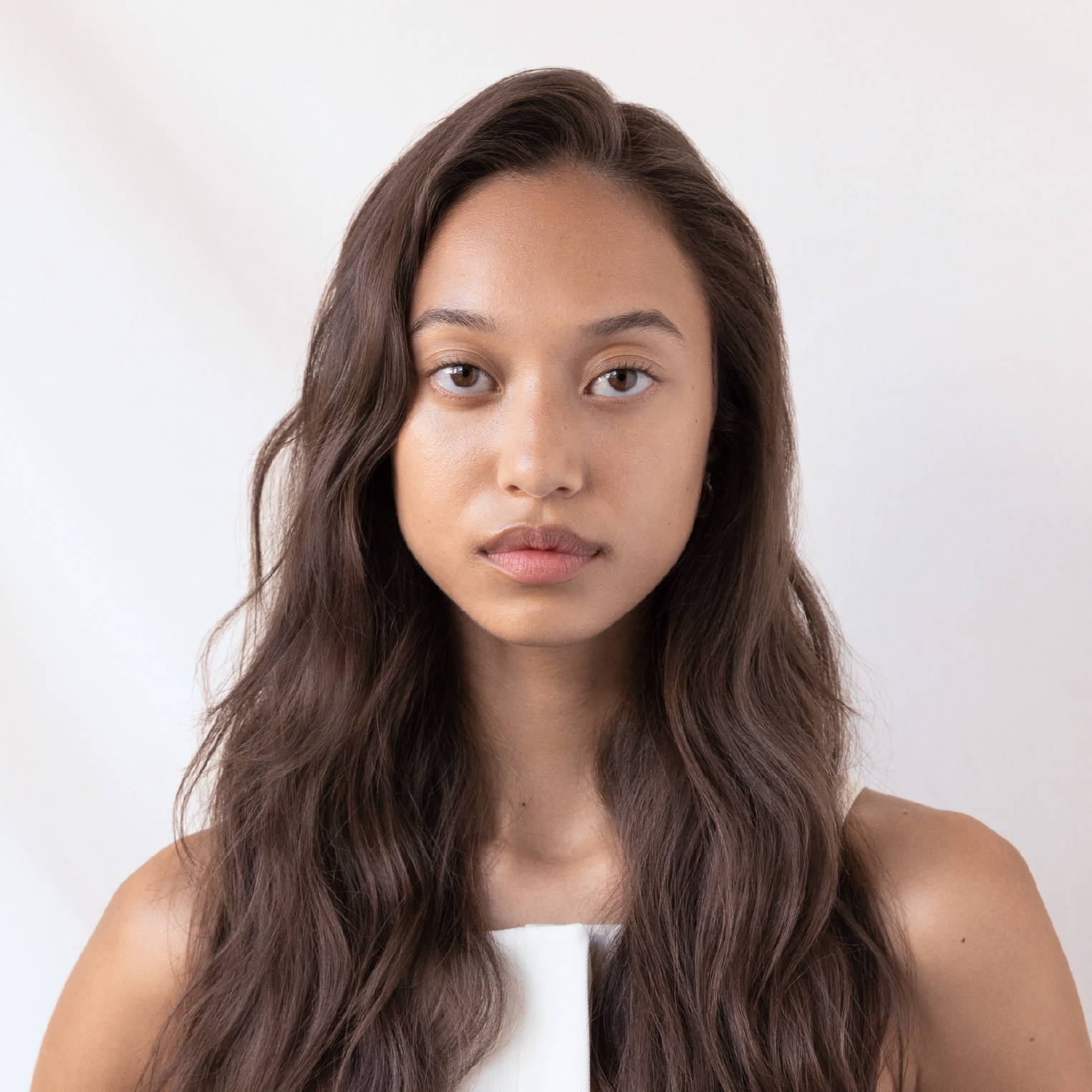 woman with long hair in a side part