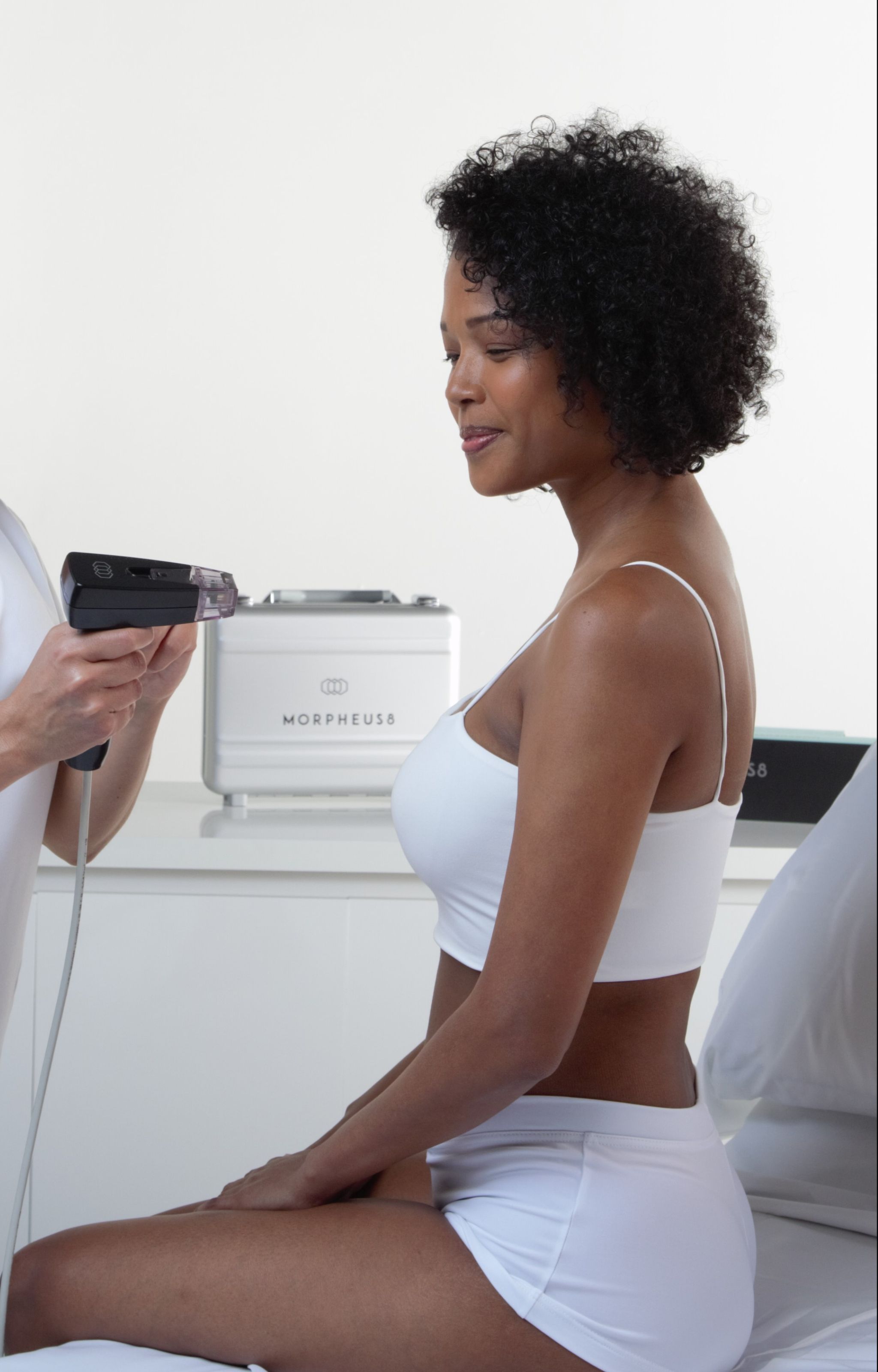Model having a consultation for Morpheus8 skincare treatment.