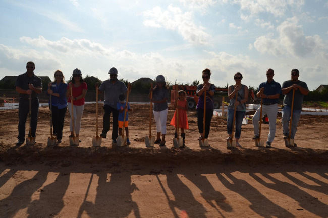 Primrose school of Wichita east representatives at the ground breaking ceremony with shovels and hard hats