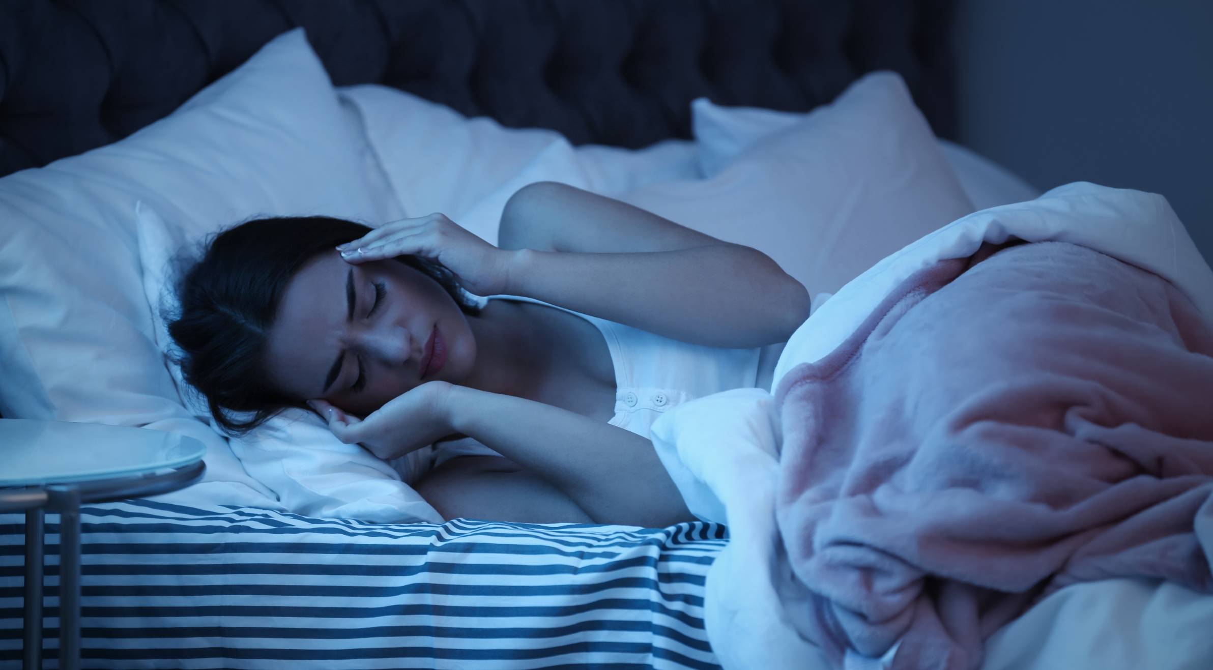 Woman having difficulty sleeping