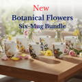 Botanical Flowers Six Mug Bundle Woman smiling while holding Klimt's The Kiss Crest mug Mug.