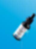 A sleek bottle of face serum with a dropper, displayed on a white pedestal against a vibrant blue background.
