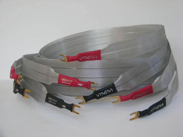 A PAIR OF USED 2 METER NORDOST VALHALLA SHOTGUN SPADE FACTORY TERMINATED SPEAKER CABLES IN EXCELLENT CONDITION.