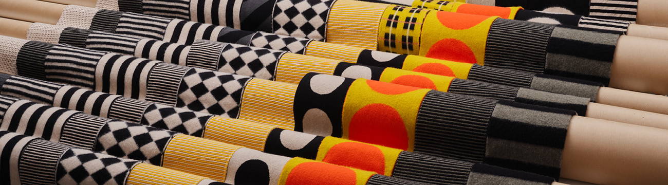 Jo Gordon scarves on cardboard packing tubes
