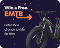 Enter to win a free Aventon Aventure 2 electric mountain bike; promotional image showing the e-bike on a stand with giveaway text