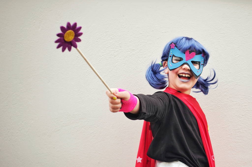 Girl dressed up in a costume.