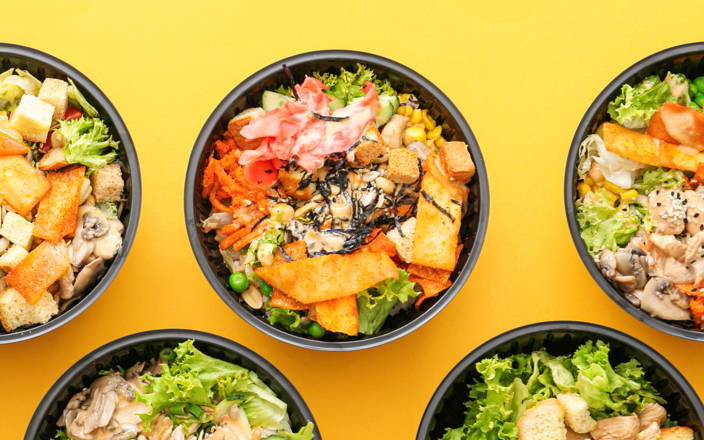 Various salads, grain bowls, and sushi bowls for Confetti's Virtual Team Lunch