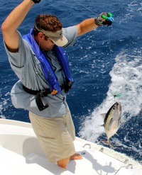 Scott Leonard catches a bite of lunch from his floating RIA.