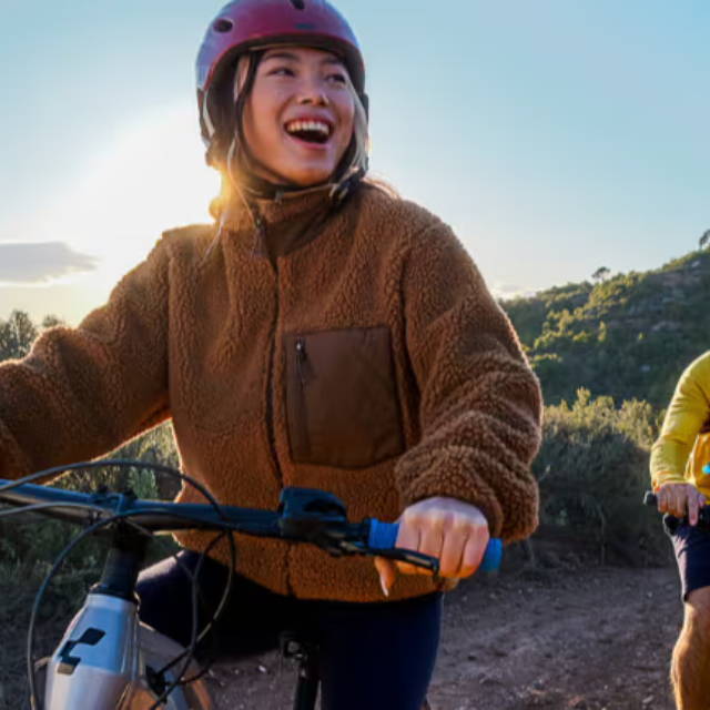 Woman smiling on an electric bike