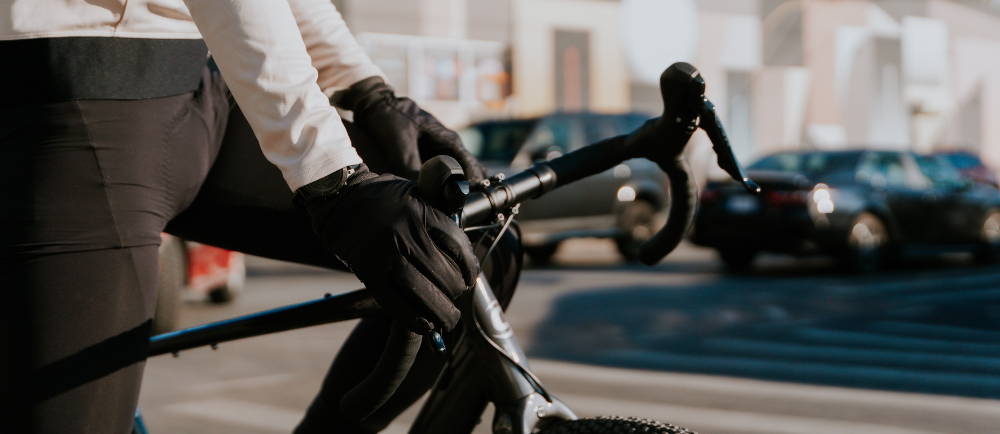 a man in winter riding gear riding a Cannondale Topstone Neo electric city bike