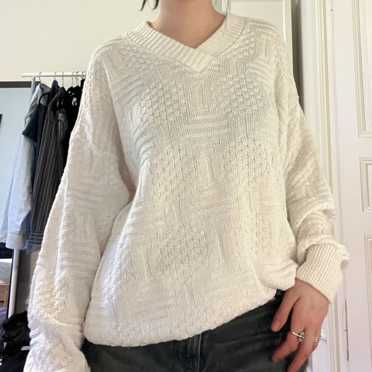 white knitted sweater