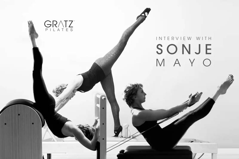 Black and white banner featuring Sonje Mayo demonstrating exercises on Gratz Pilates equipment.