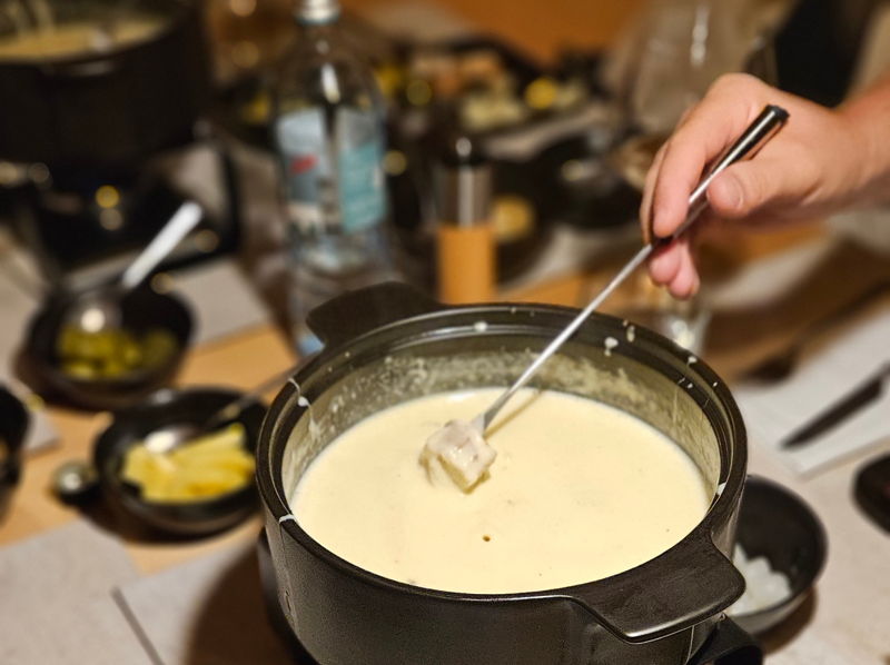 Käsefondue als besondere Spezialitäten aus der Küche - natürlich mit Käse aus dem Bregenzerwald