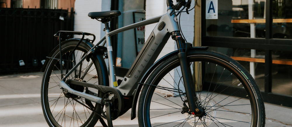 a silver Gazelle Ultimate C380+ electric city bike