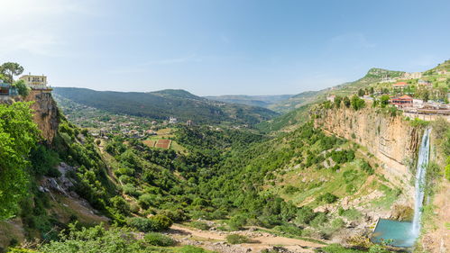 Panorama of Jezzine town and landscape with famous 90 meter high waterfall pouring into a dry valley, in Southern Lebanon
