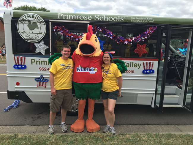 Percy the chicken mascot poses with Primrose staff for fourth of July celebrations