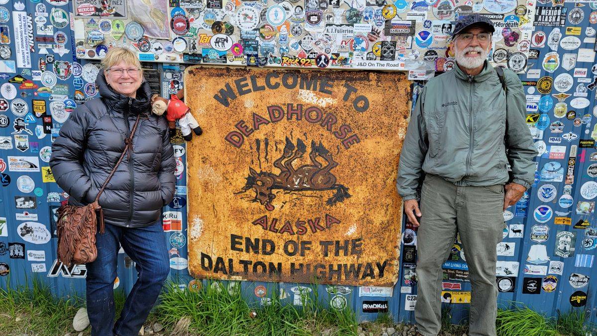 Nestor and Mary Fernandez at the end of the Dalton Highway in Dead Horse, Alaska